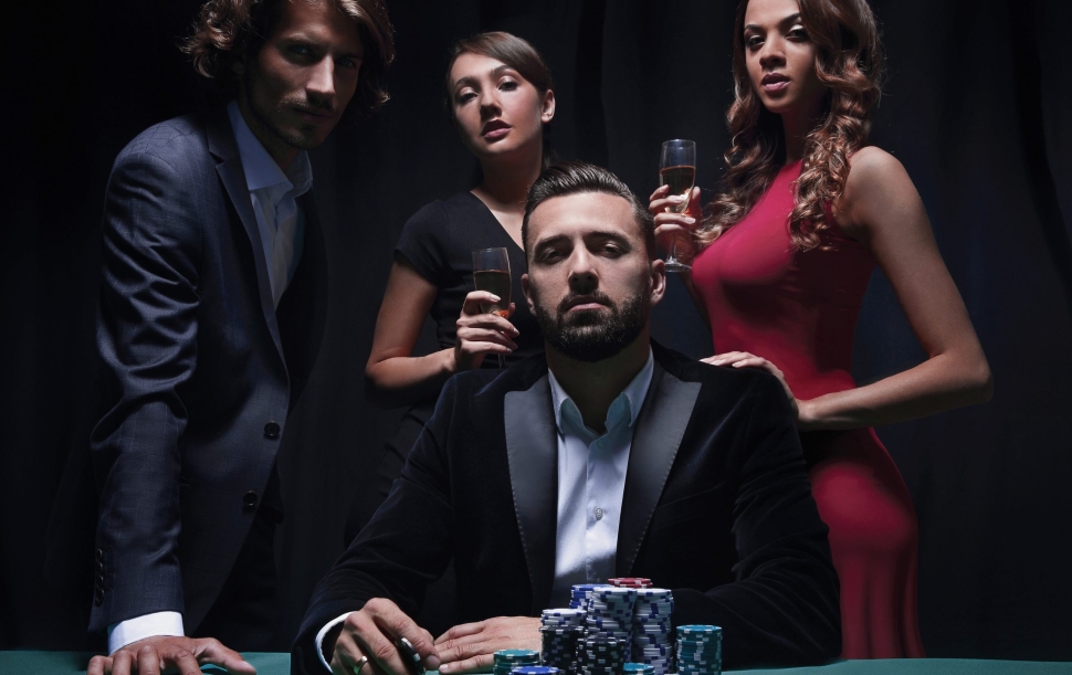 Poker player on black background